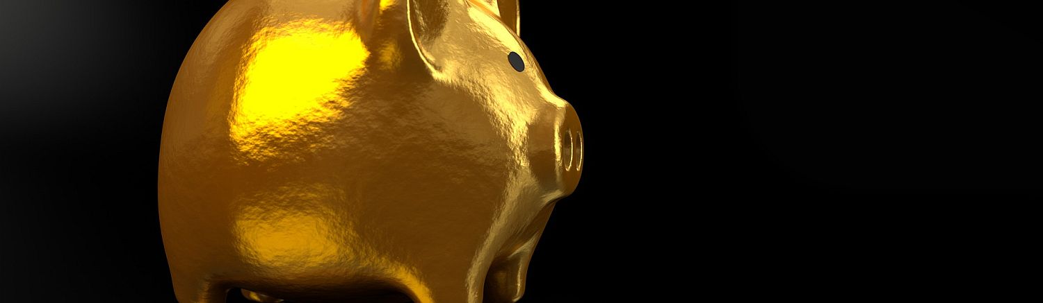 Goldenes Sparschwein als Symbol für Wertschöpfung durch Konfliktlösung im Unternehmen – Unternehmen, HR und Führungskräfte profitieren von professionellem Konfliktmanagement.